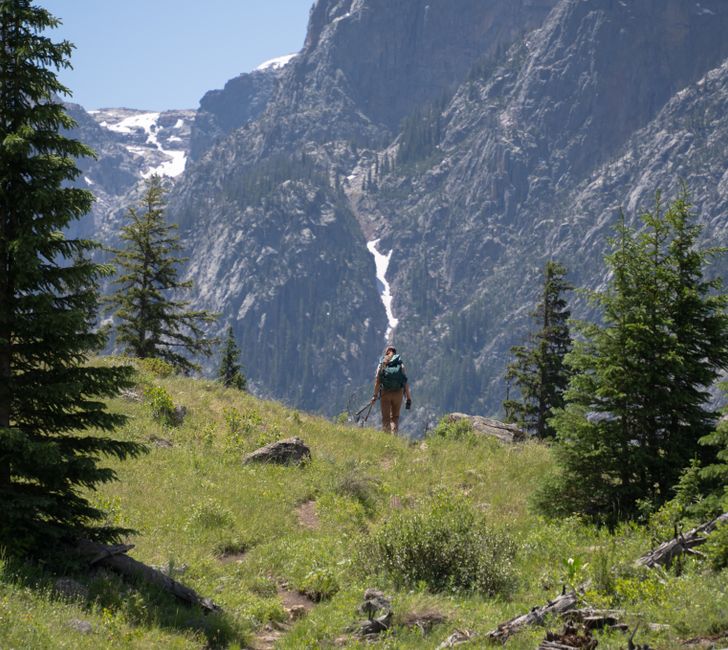Explore the rugged landscapes of Pinedale, Wyoming with a solitary hiker on a summer journey.