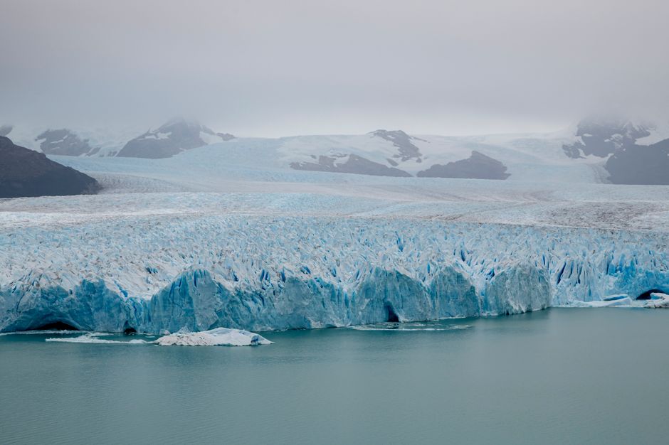 Breathtaking view of glaciers in Santa Cruz, Argentina with icy blues and serene waters.