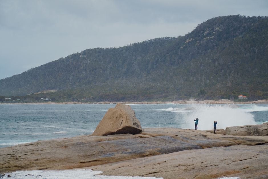 Capture of majestic ocean waves hitting the rocks at Bicheno, Tasmania, Australia.